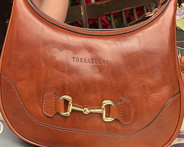 Chestnut brown Tornabuoni vegetable-tanned Italian leather shoulder bag with gold horsebit hardware and embossed Tornabuoni name